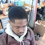 Men's haircut and black fibers