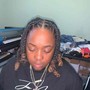 Loc retwist (shoulder length)