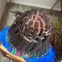 Loc retwist(on head with shaved sides)