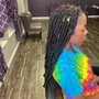 Loc retwist and style