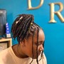 Large  loc retwist on undercut. Shoulder length