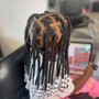 Tribal braids/ half knotless braids.