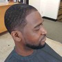 Full service men's haircut and beard/mustache trim with hot towel service