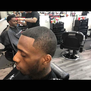 nas half moon haircut