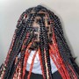 Rubber band knotless Braids