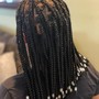 medium mid back knotless Braids