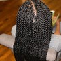 medium mid back knotless Braids