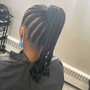 Big feed in braids into a bun