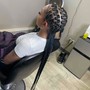 Big feed in braids into a bun