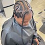 Big feed in braids into a bun