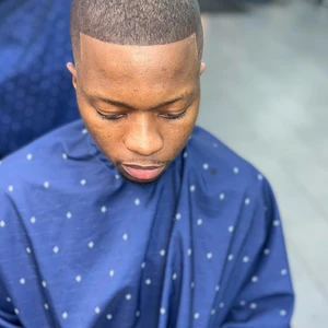 nas half moon haircut