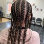 Small cornrows in between braids