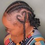 Med Knotless w/ tribal braids in the front (mid back)