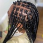 Kid's cornrow braids with natural hair