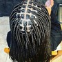 Cornrows with added hair