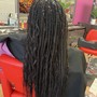 Box Braids pass shoulder length.