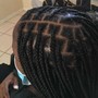 Feed ins at the top and knotless braids in the back