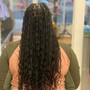 Medium knotless braids  butt length with curls