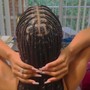 Cornrows with added hair