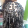 Curls on ends of box braids