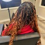 Dreadlock retwist