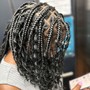 Knotless bohemian braids (medium)mid back