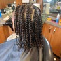 She is. Braids + Twists