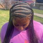 Large individual with 5 braids in the front