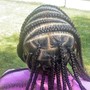 Large individual with 5 braids in the front