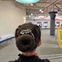 Simple bun Updo for figure skating competition. Glitter spray optional.