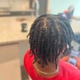 Two strand twists(shaved sides)