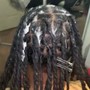 Loc retwist and style