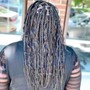 Jumbo knotless box braids.