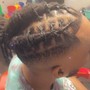 Kid's individual plaits with beads