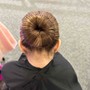 Simple bun Updo for figure skating competition. Glitter spray optional.