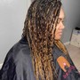 Side shaved medium Box Braids