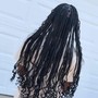 Waist length medium knotless braids