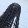 Waist length medium knotless braids