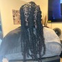 Loc retwist and style and