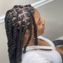 Feed in braids / sew in at the back