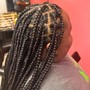 Medium Knotless Braids (mid back)