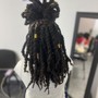 Hair extensions added to locs