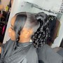 Ponytail with rubber designs or braids added