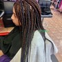 Box Braids pass shoulder length.