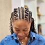 Two lines of individual crochet Locs with the rest hair braided down