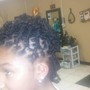 Loc retwist with updo above shoulder