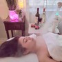 Microdermabrasion with oxygen and light therapy.