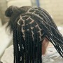 Cornrows on natural hair(no extension added and no stitsh. Up to 10 to 12 braids )