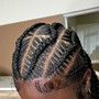 Half up half down with stitch braids