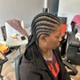 Cornrows, or 6 to 8 stitched braids